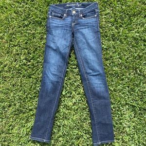 Dark wash American Eagle skinny jeans. Size 0